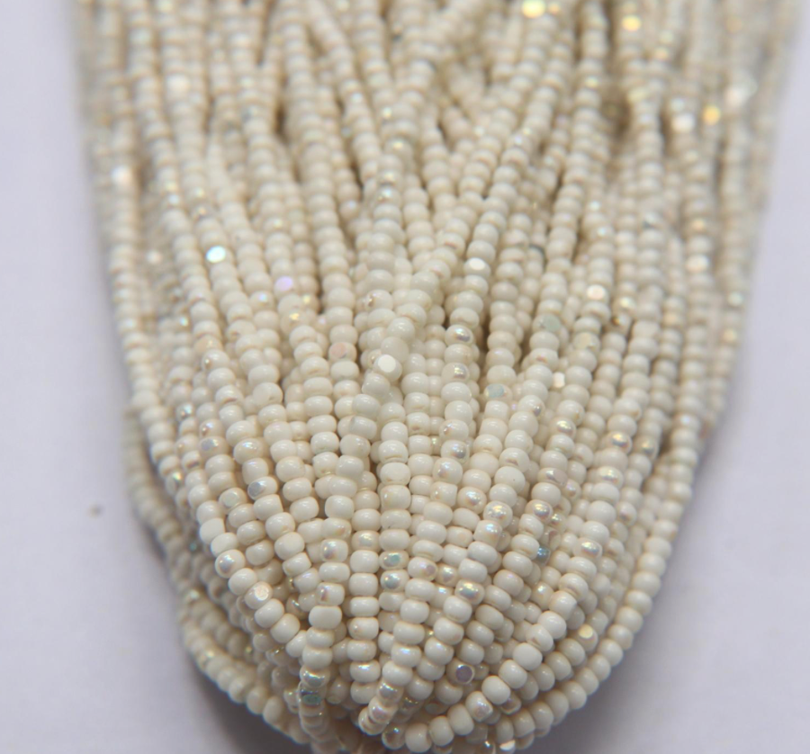 sheen Charlotte cut beads chalk white ab