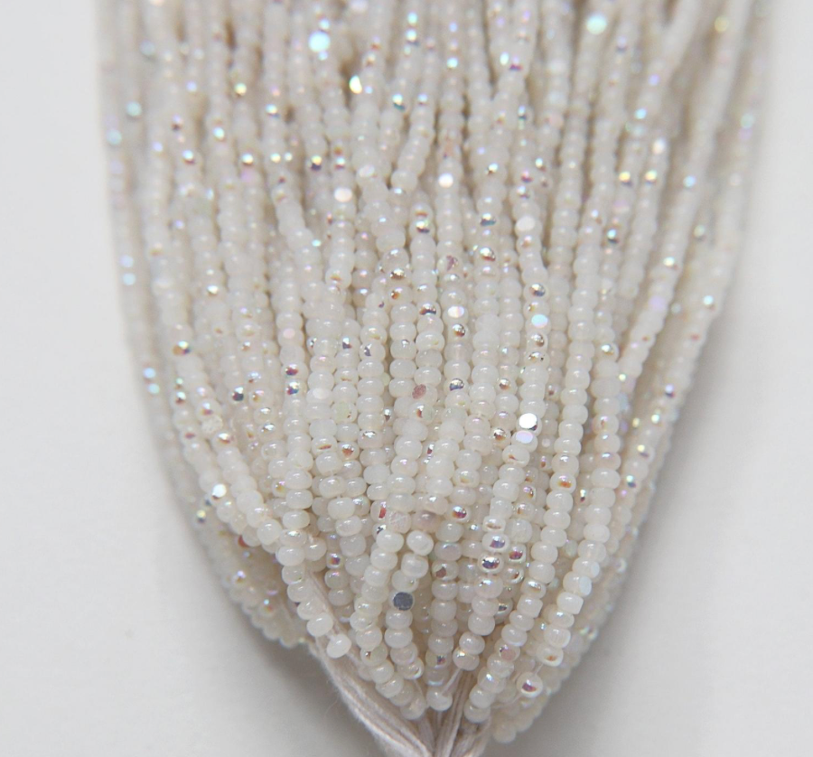 sheen Charlotte cut beads white opal ab