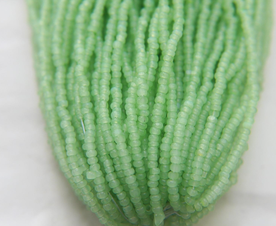 Charlotte cut seed beads opal color