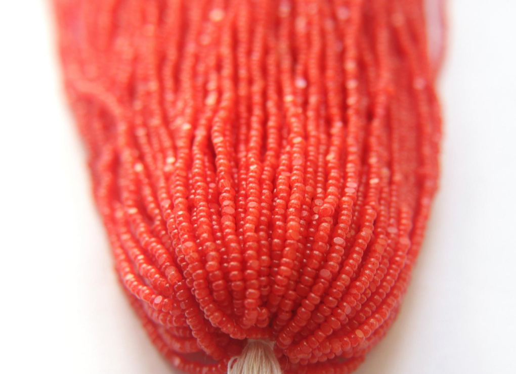 red orange seed beads Charlotte cut