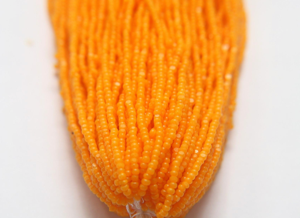 orange seed beads Charlotte cut
