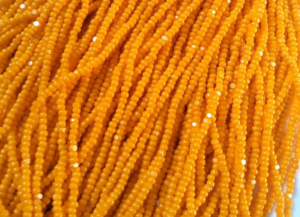 Charlotte cut seed beads orange