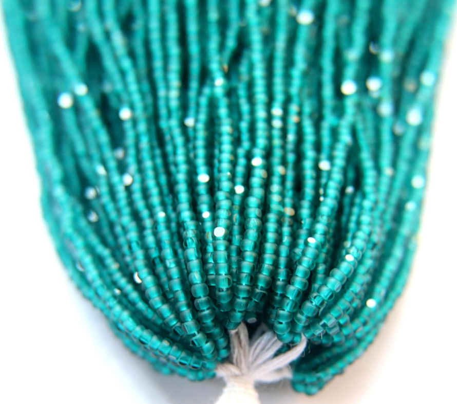 Charlotte cut beads teal green