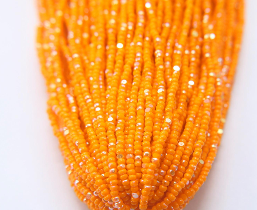 light orange Charlotte cut beads